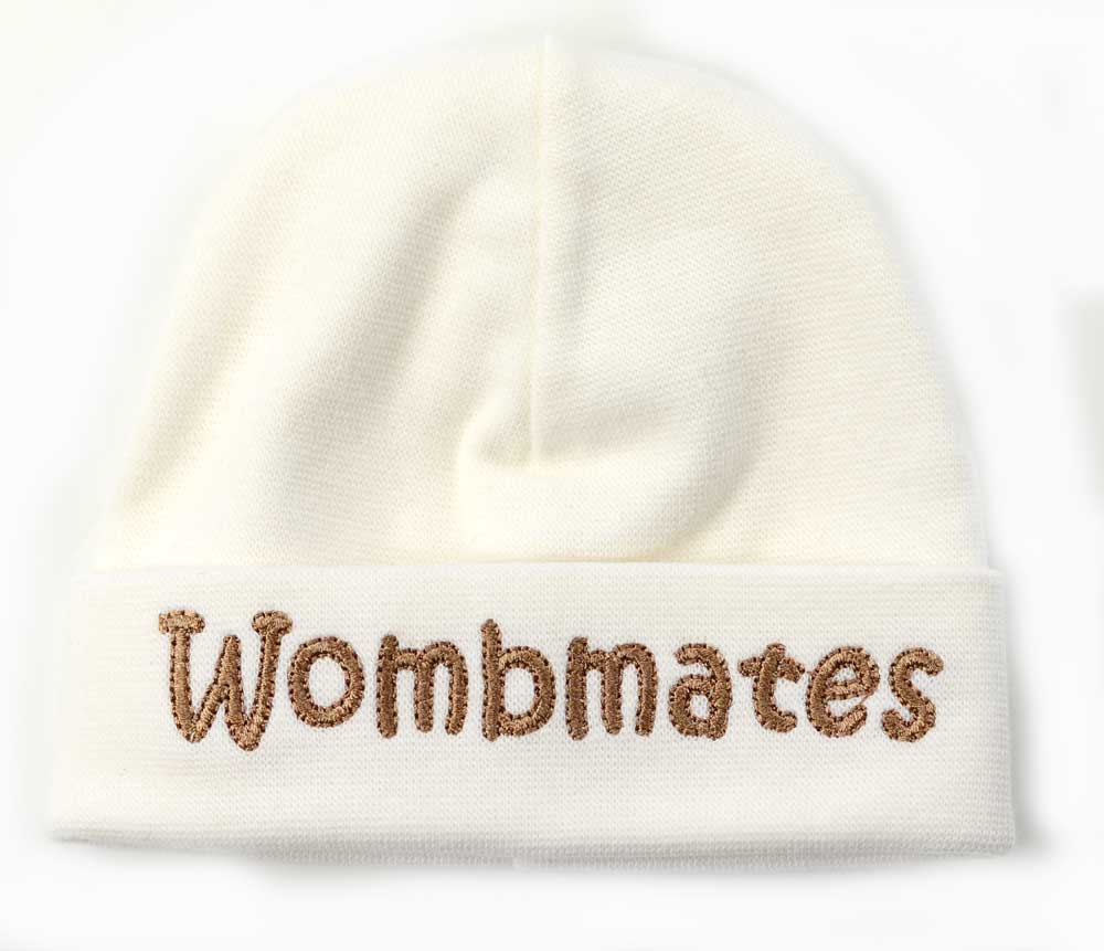 Cream wombmates cap